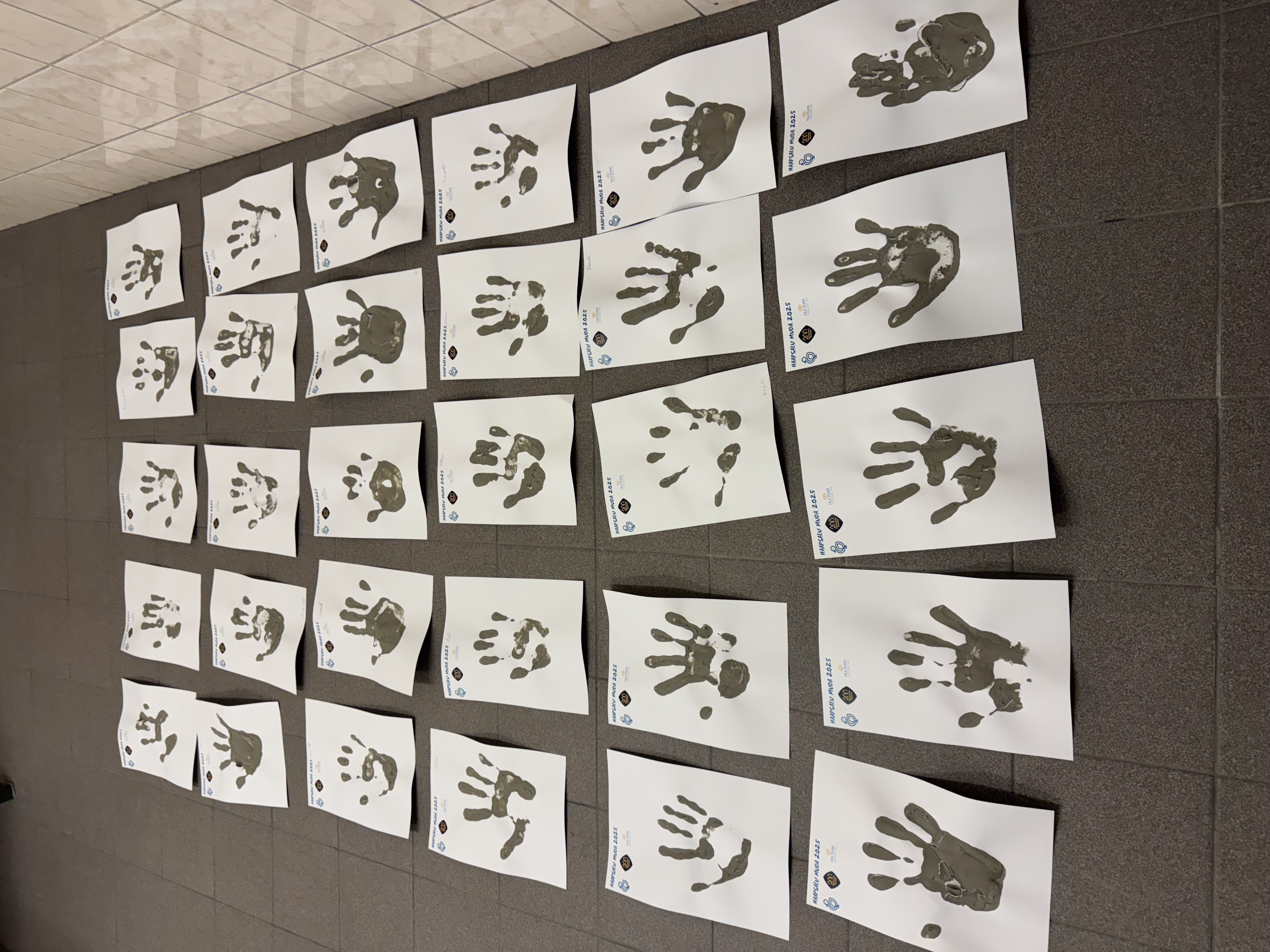 Fun shared activity - making a mud hand together